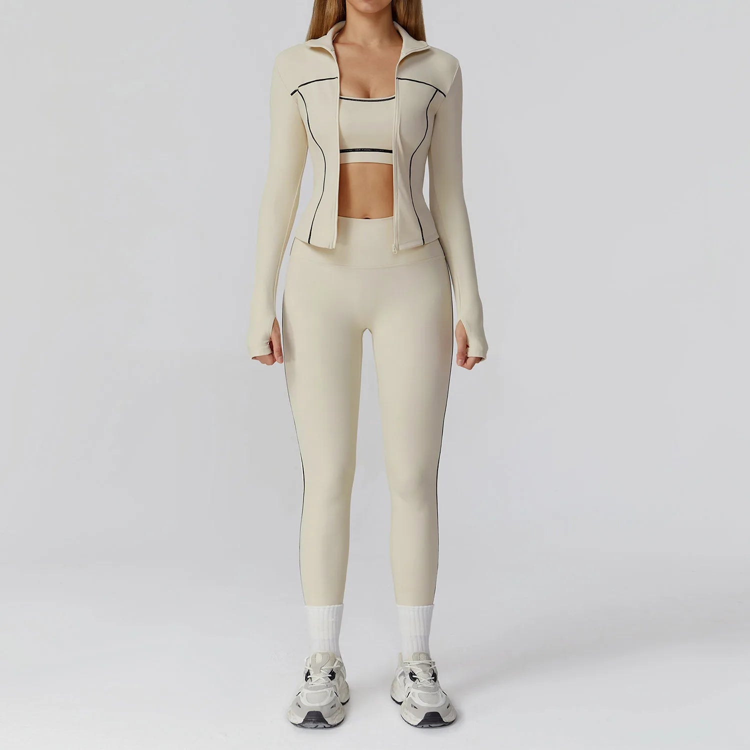 ALMASTRONG women's yoga set with long-sleeved top, leggings, and sports bra, ideal for fitness and gym workouts.