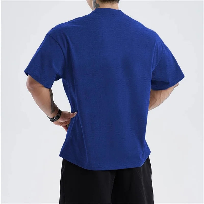 men Loose oversized short sleeved T-shirt men summer mesh sports