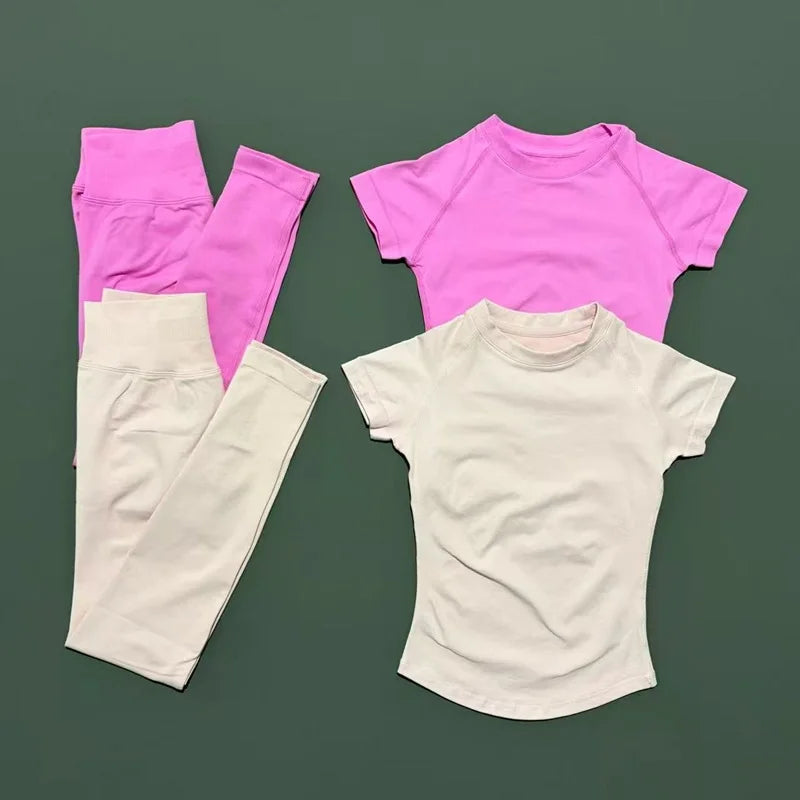 ALMASTRONG women's impact sports set with short sleeve seamless yoga top and matching leggings for workout and running.