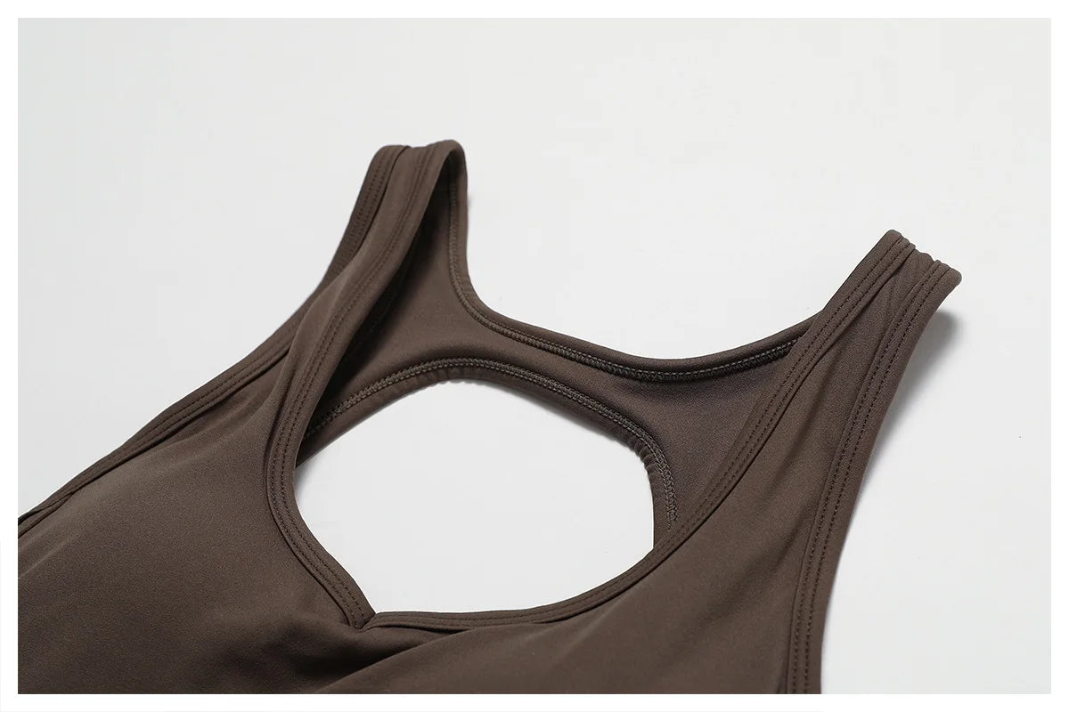 Women’s ALMASTRONG sports jumpsuit for gym, yoga, and fitness training, featuring a stretchy, comfortable workout bodysuit design.