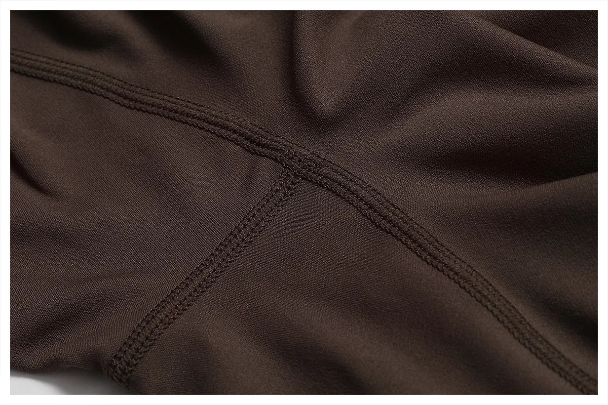 ALMASTRONG women’s sports jumpsuit with stretch fabric, ideal for gym, yoga, and fitness workouts, featuring a sleek, form-fitting design.