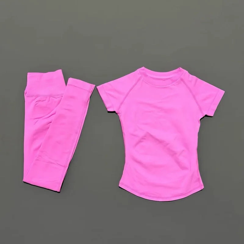 ALMASTRONG impact sports set with short sleeve seamless yoga top and matching leggings for women's workout and running fitness.