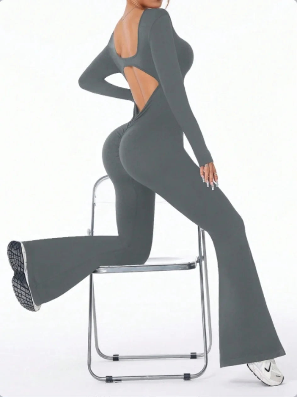 ALMASTRONG women's long sleeved solid color compression jumpsuit with bell bottom pants, suitable for yoga and athletic wear.