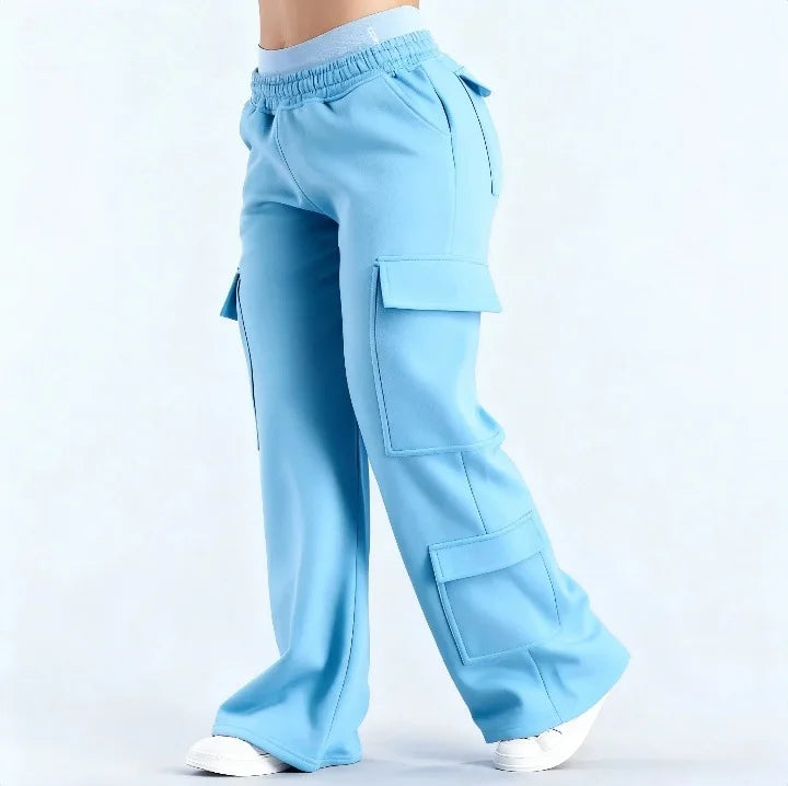 Women’s wide-leg cargo pants by ALMASTRONG with high waist, streetwear style, utility pockets, and relaxed fit.