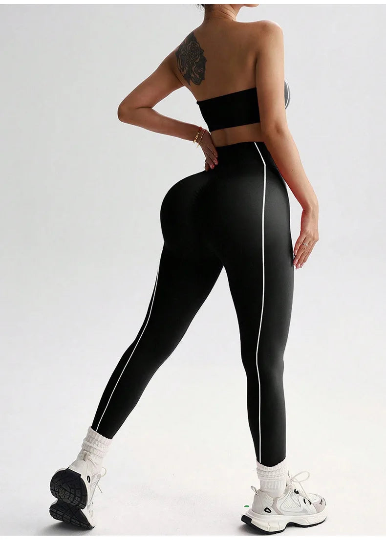 ALMASTRONG women's yoga wear set with color-blocked corset top and peach slim-fit long pants for fitness and activewear.