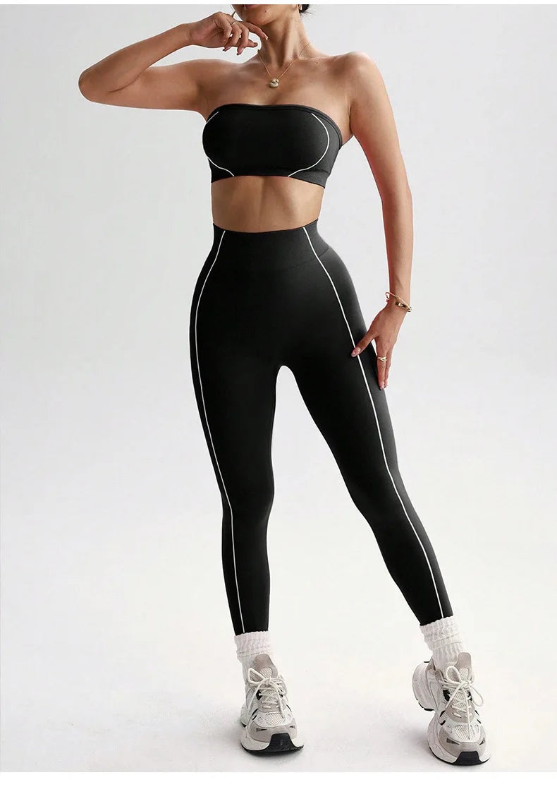 ALMASTRONG women's yoga wear set with color-blocking corset top and peach slim-fit long pants for fitness and activewear.