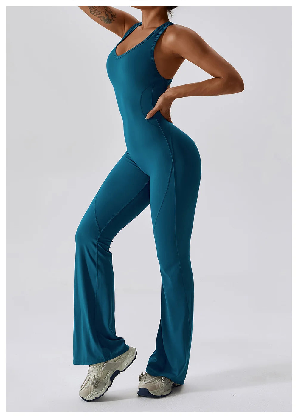 Women’s ALMASTRONG sports jumpsuit for gym, yoga, and fitness; stretchy, comfortable workout bodysuit with sleeveless design.