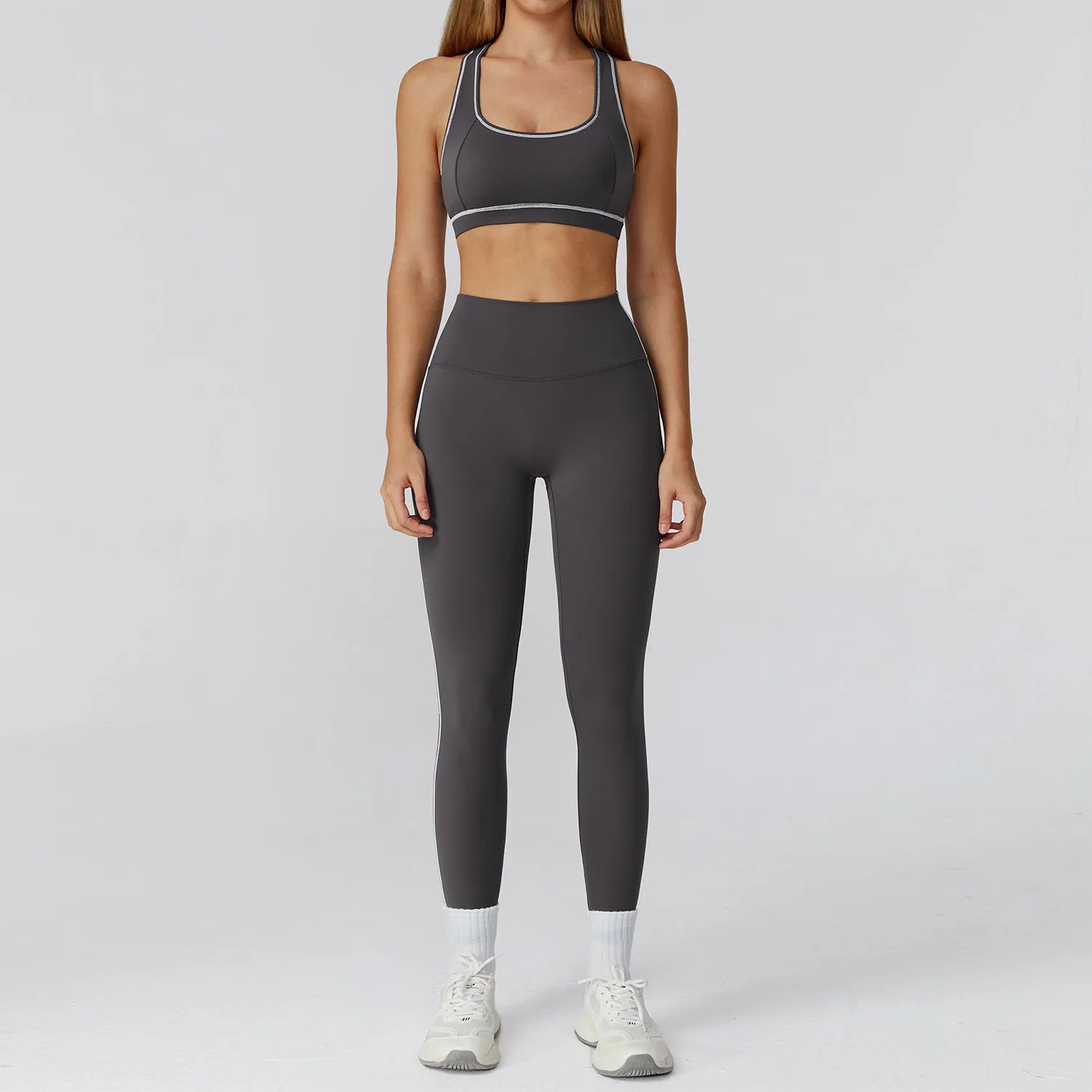 ALMASTRONG women's yoga set with long-sleeved top, leggings, and sports bra for fitness and workout activities.