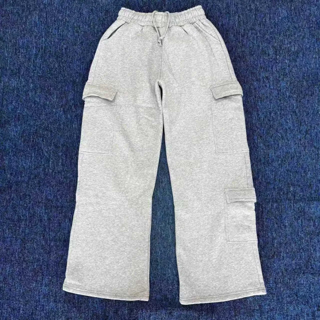Women’s high-waist wide-leg cargo pants by ALMASTRONG featuring streetwear-inspired utility design and multiple functional pockets.