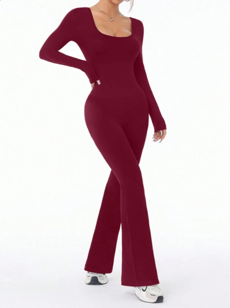 ALMASTRONG women's long sleeve compression jumpsuit with bell bottom pants, perfect for yoga and active wear, in solid color.