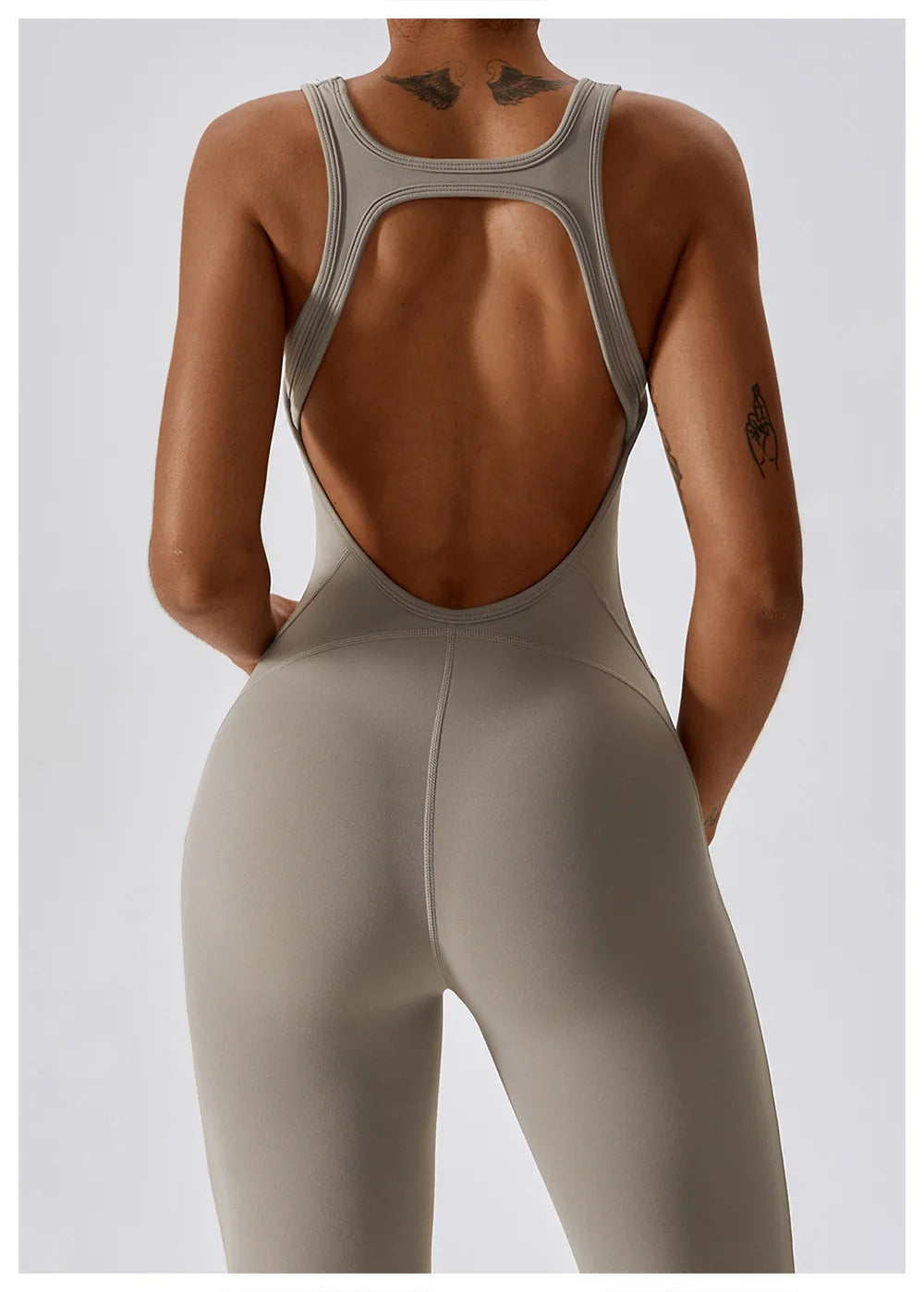 ALMASTRONG women's sports jumpsuit with stretch fabric, ideal for gym, yoga, and fitness training, featuring a sleek, fitted design.