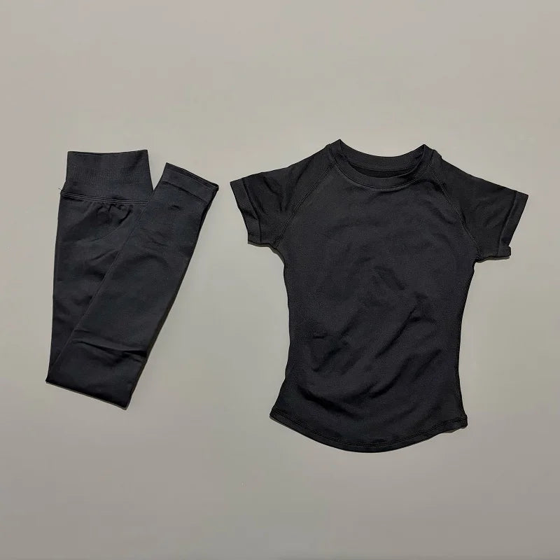ALMASTRONG impact sports set with short sleeve seamless yoga tops and matching leggings for women's workout and running.