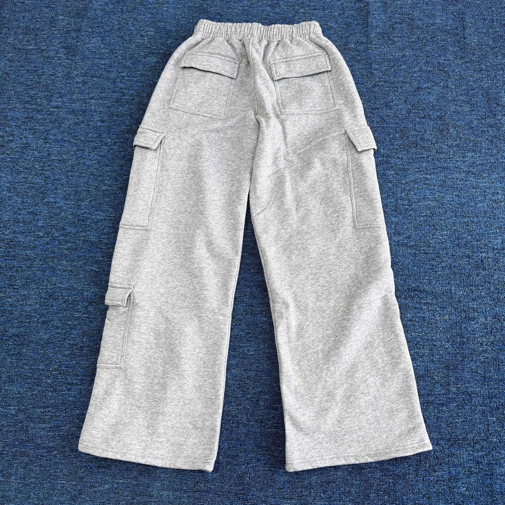 Women’s wide-leg cargo pants by ALMASTRONG featuring high-waist streetwear utility trousers with multiple pockets and relaxed fit.