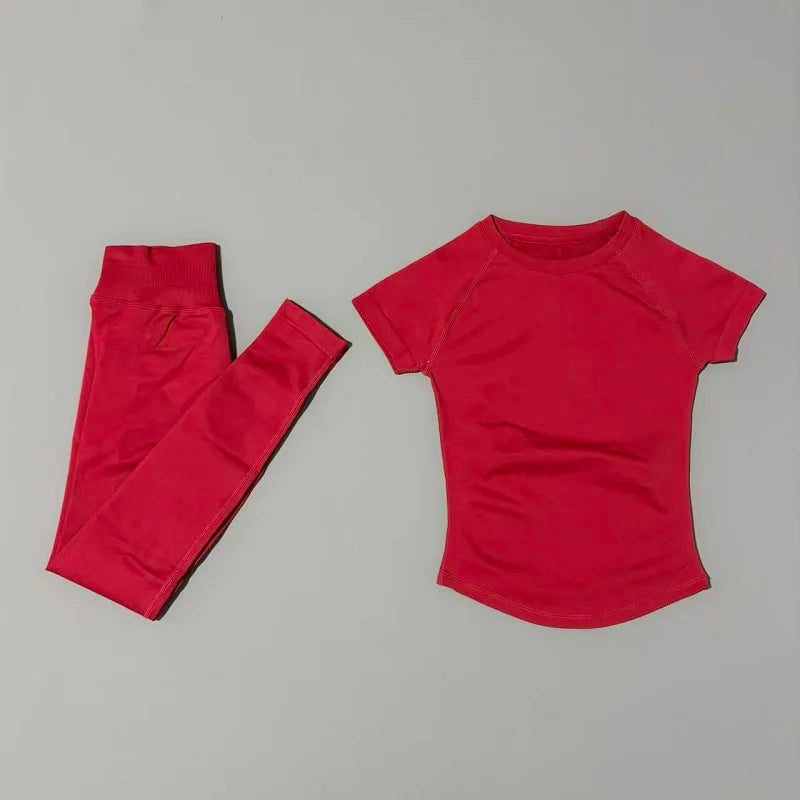 Almastrong impact sports set with short sleeve seamless yoga top and matching leggings for women’s workout and running fitness.