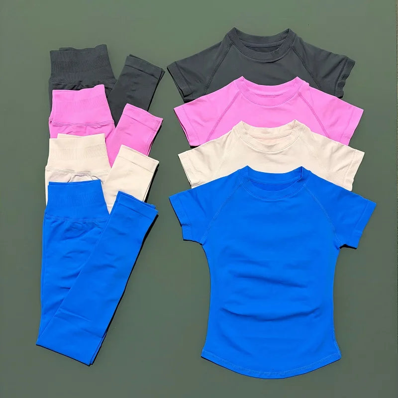 ALMASTRONG women's impact sports set with short sleeve seamless yoga top and matching leggings for workout and running fitness.