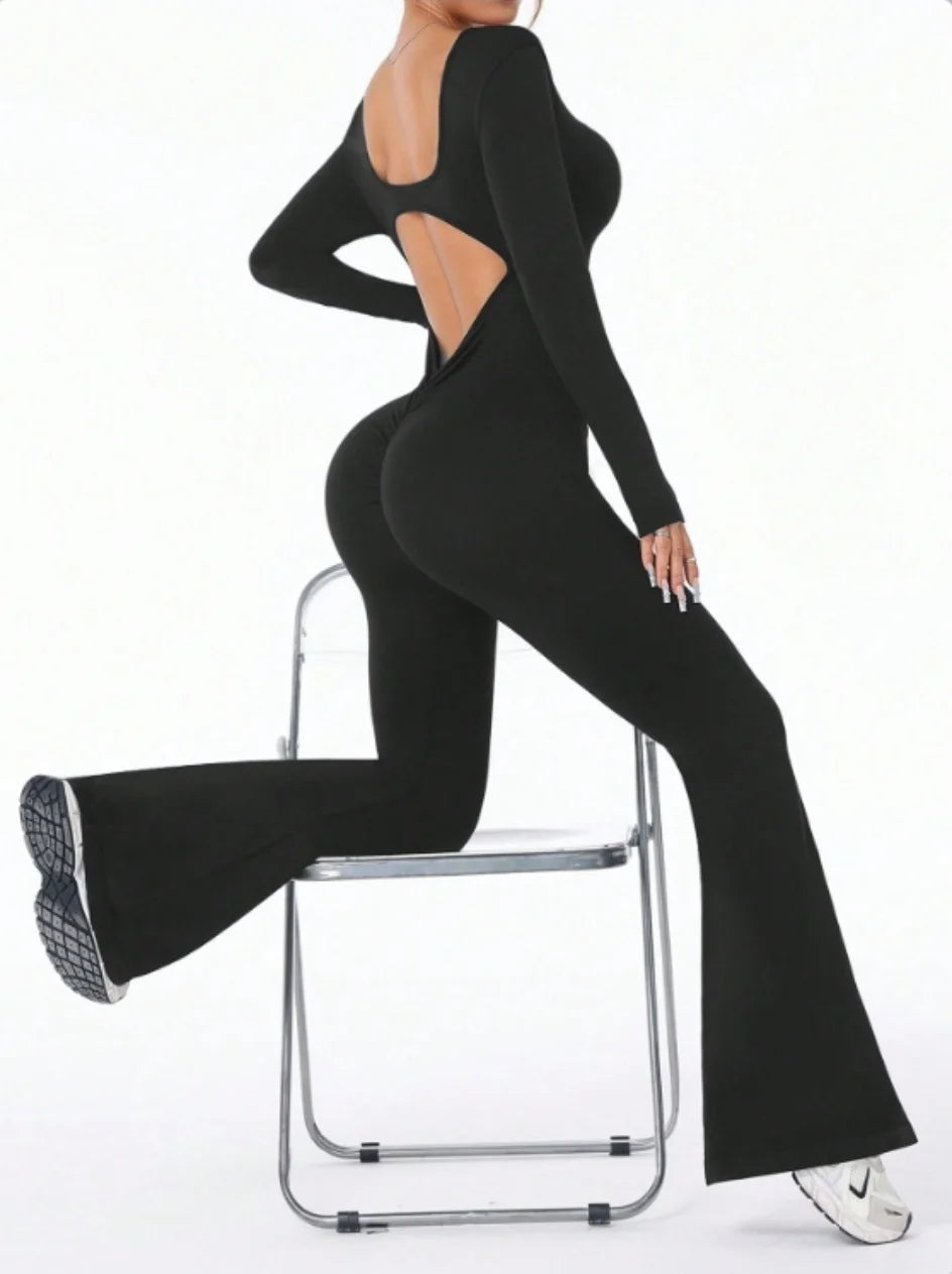 ALMASTRONG women's long-sleeve compression jumpsuit with bell bottom pants, perfect for yoga and active sportswear.