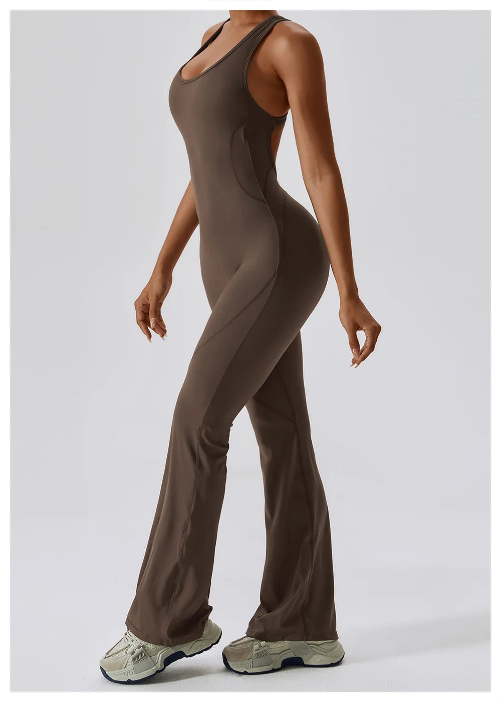 Women’s ALMASTRONG sports jumpsuit with a fitted yoga and workout bodysuit, featuring stretch fabric for fitness and training activities.