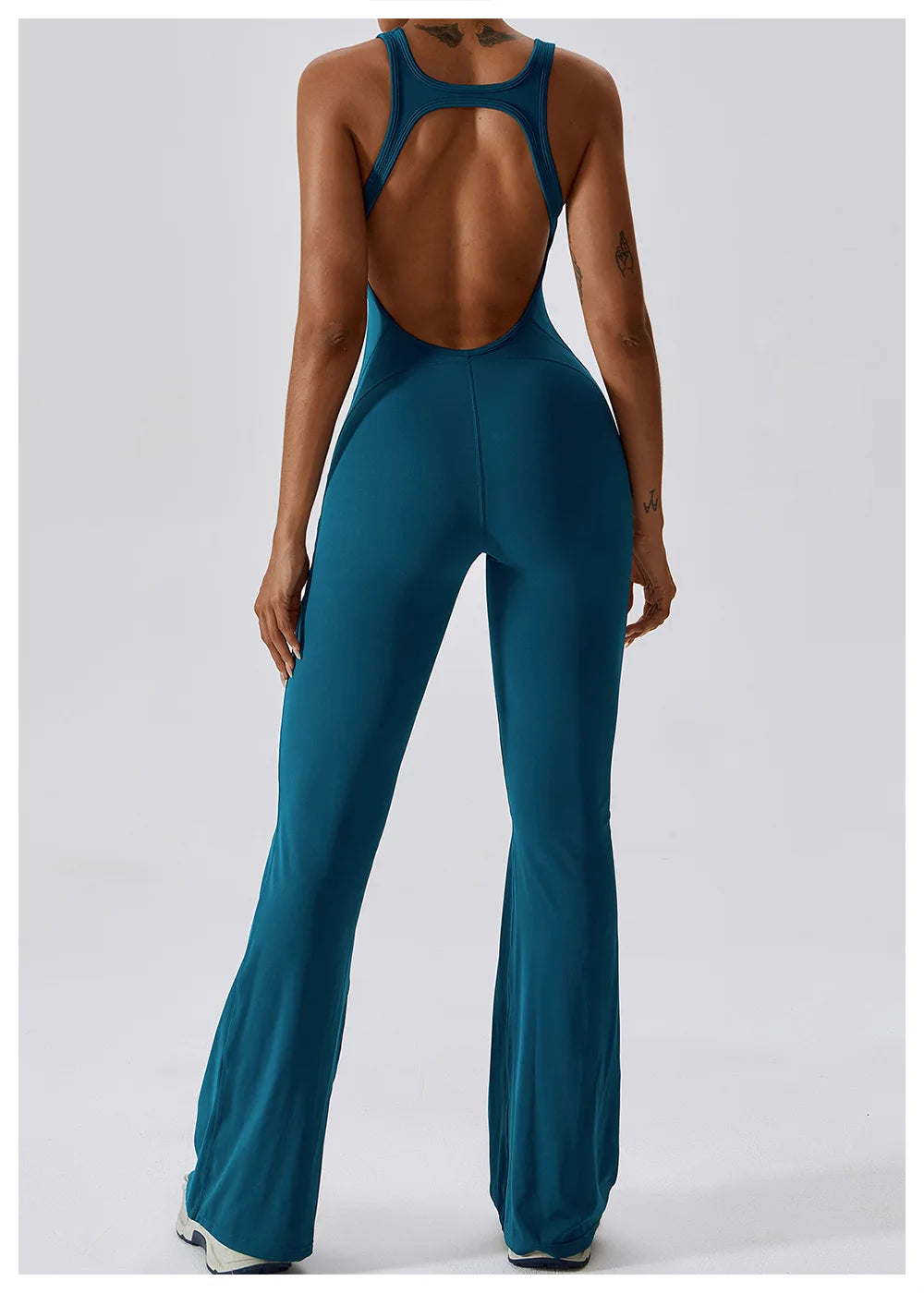 Women’s ALMASTRONG sports jumpsuit, stretchable gym and yoga romper, designed for fitness and workout activities.