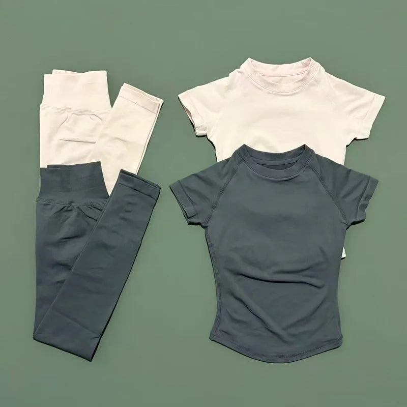 AlmaStrong women's impact sports set with short sleeve seamless yoga top and matching leggings for workout and running.