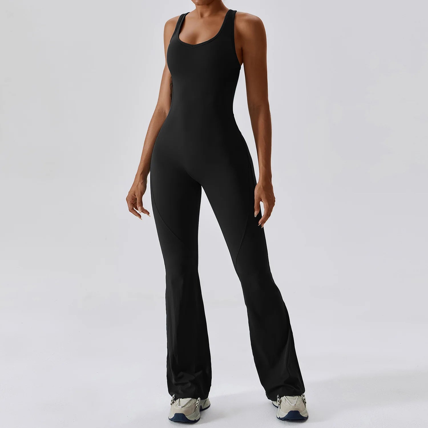ALMASTRONG women's sports jumpsuit, yoga and workout bodysuit with stretch fabric, designed for gym, training, and fitness activities.