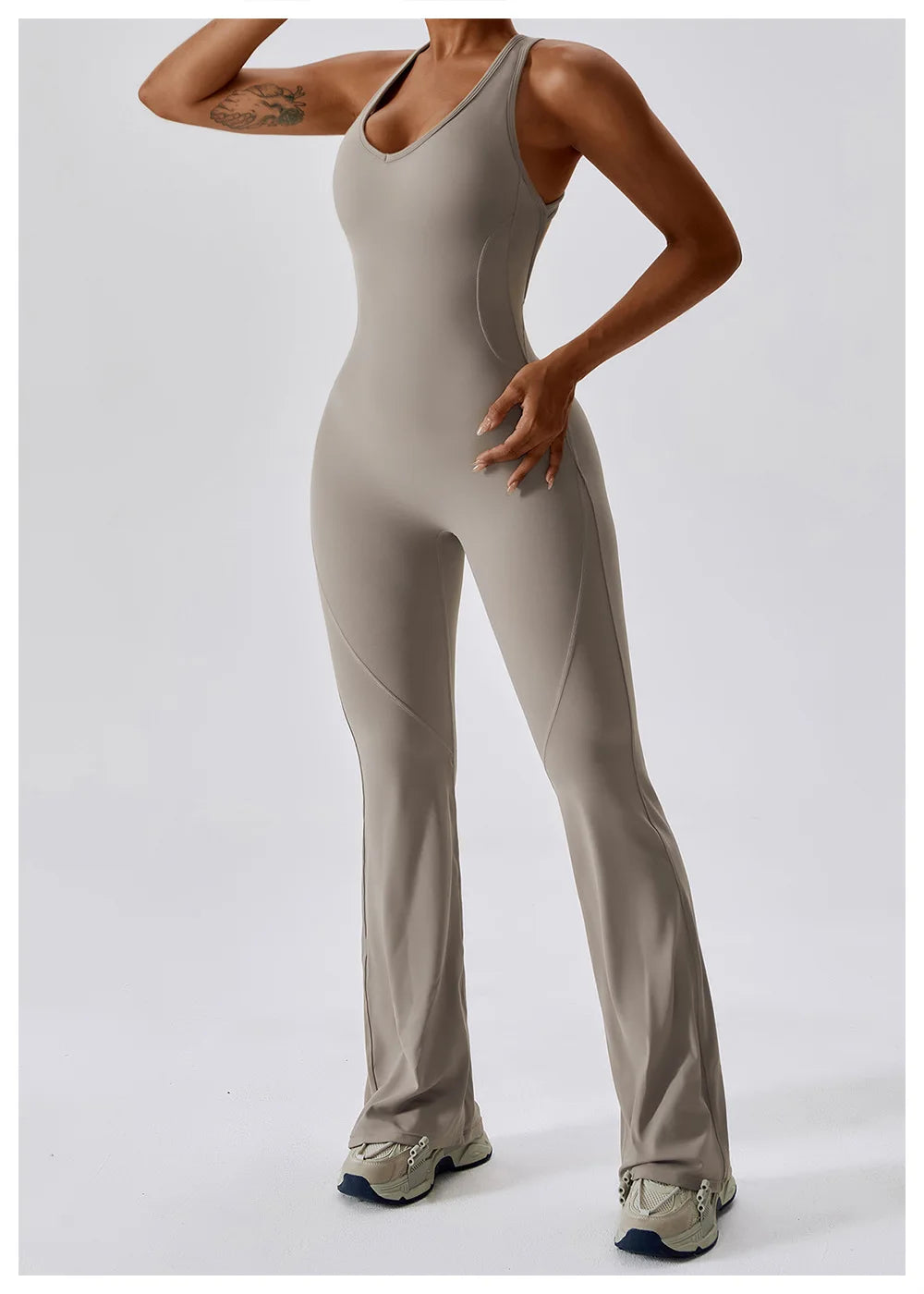 Women’s ALMASTRONG sports jumpsuit, stretch yoga and workout romper, ideal for gym, training, and fitness activities.
