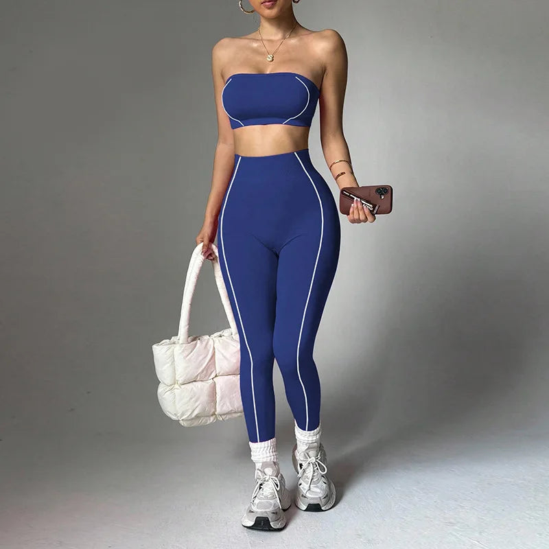 Women's yoga wear set by ALMASTRONG featuring a color-blocking corset top and peach slim-fit long pants for fitness and comfort.