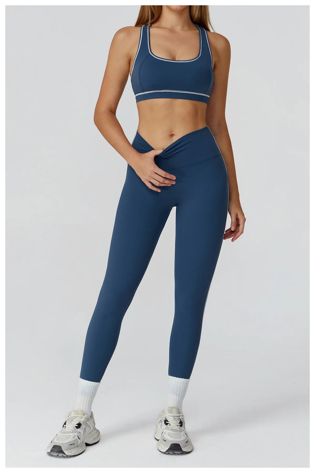 ALMASTRONG women's yoga set with long sleeve top and leggings, ideal for fitness and workout, in sleek, comfortable sportswear.