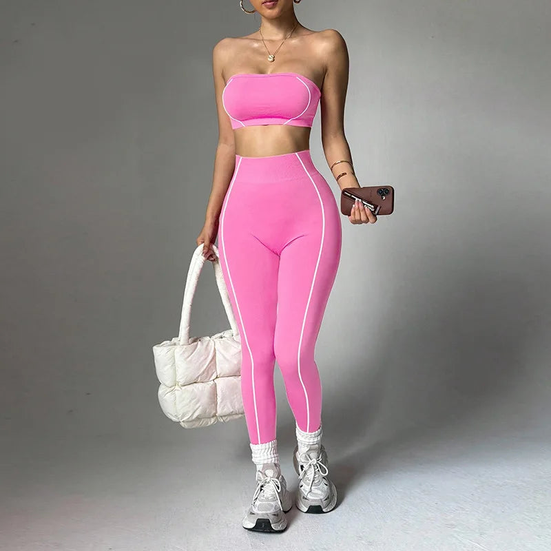Women's color-blocking yoga wear set by ALMASTRONG with a peach corset top and slim-fit long pants for fitness and activewear.